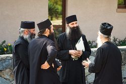 Some Serbian Orthodox monks with the bishop Porfirje of Jegar, igumen of the monastery of Kovilj (Novi Sad)